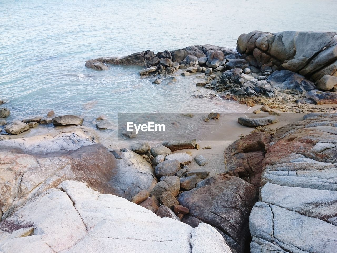 High angle view of rocks on shore