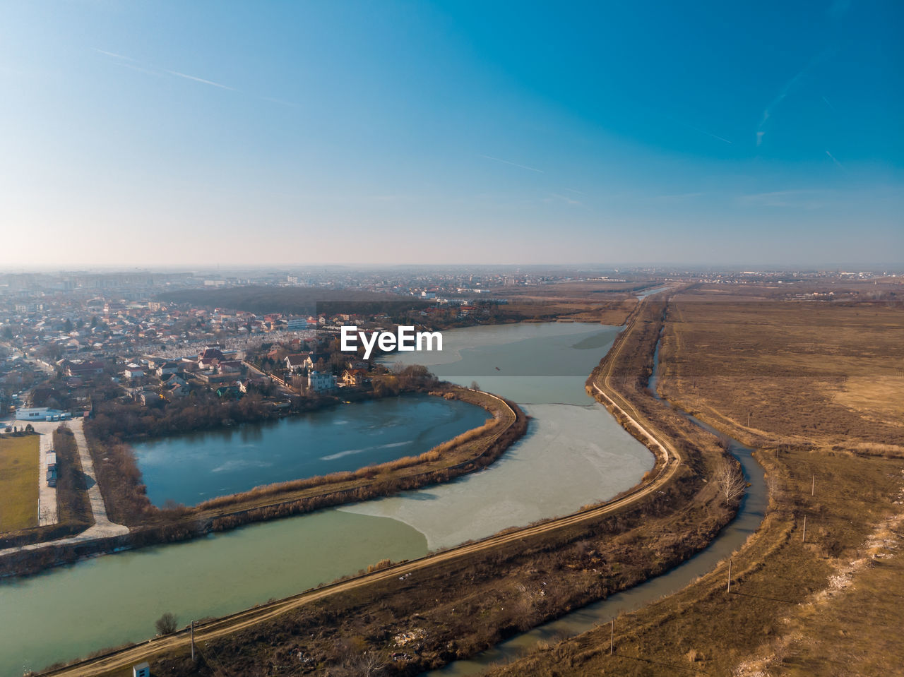 Aerial landscape of the dambovita river close to morii lake, bucharest, romania.