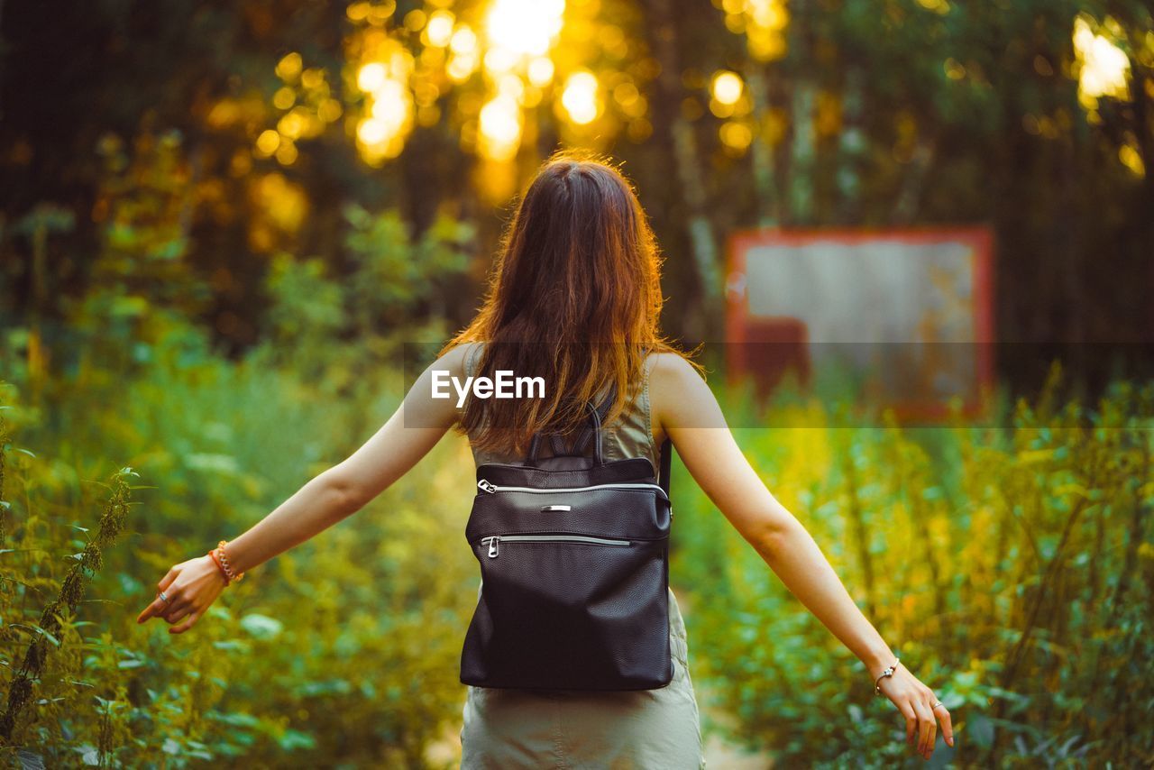 Rear view of woman walking