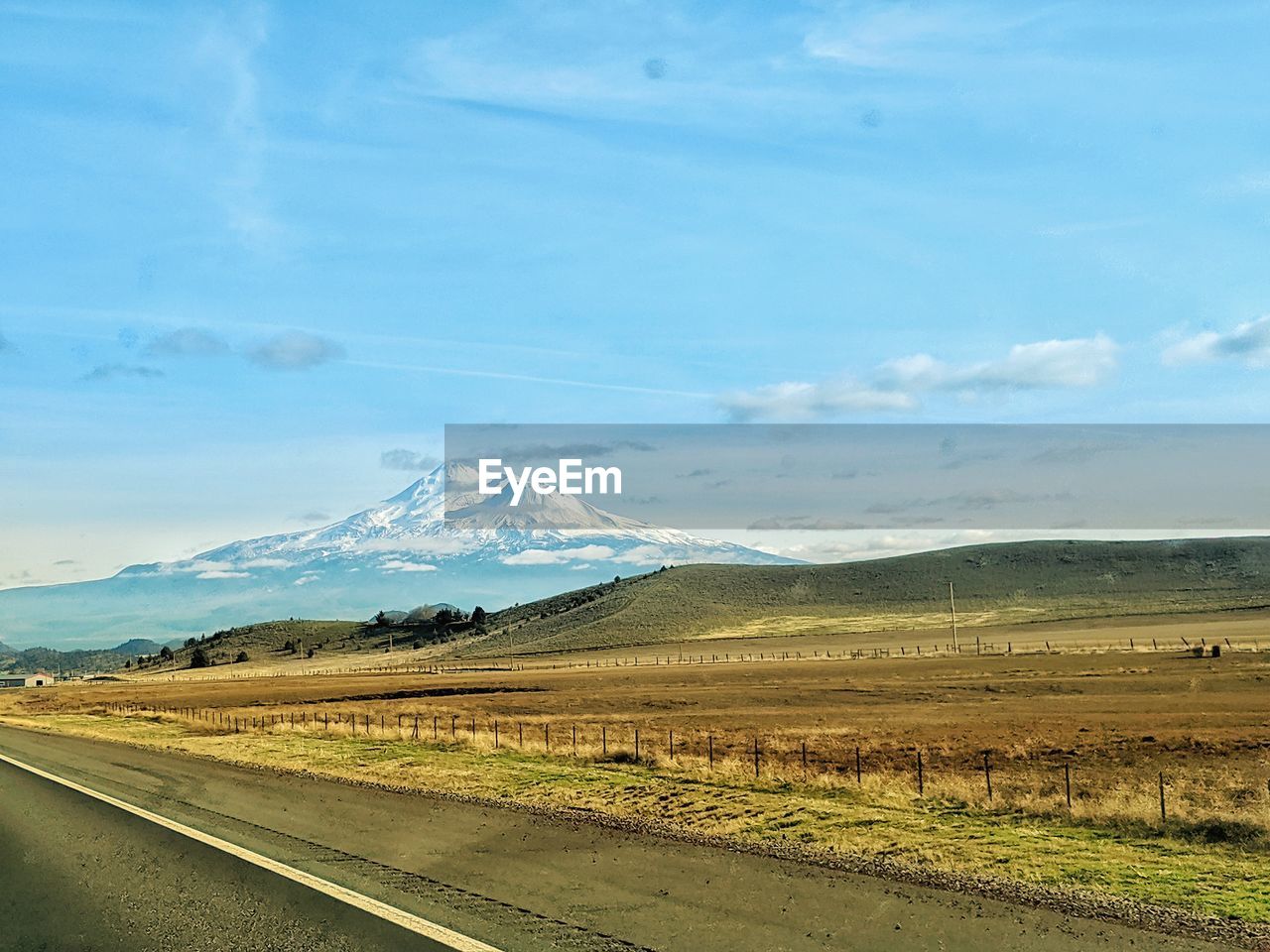 Scenic view from highway against snow covered mt shasta in northern california. 