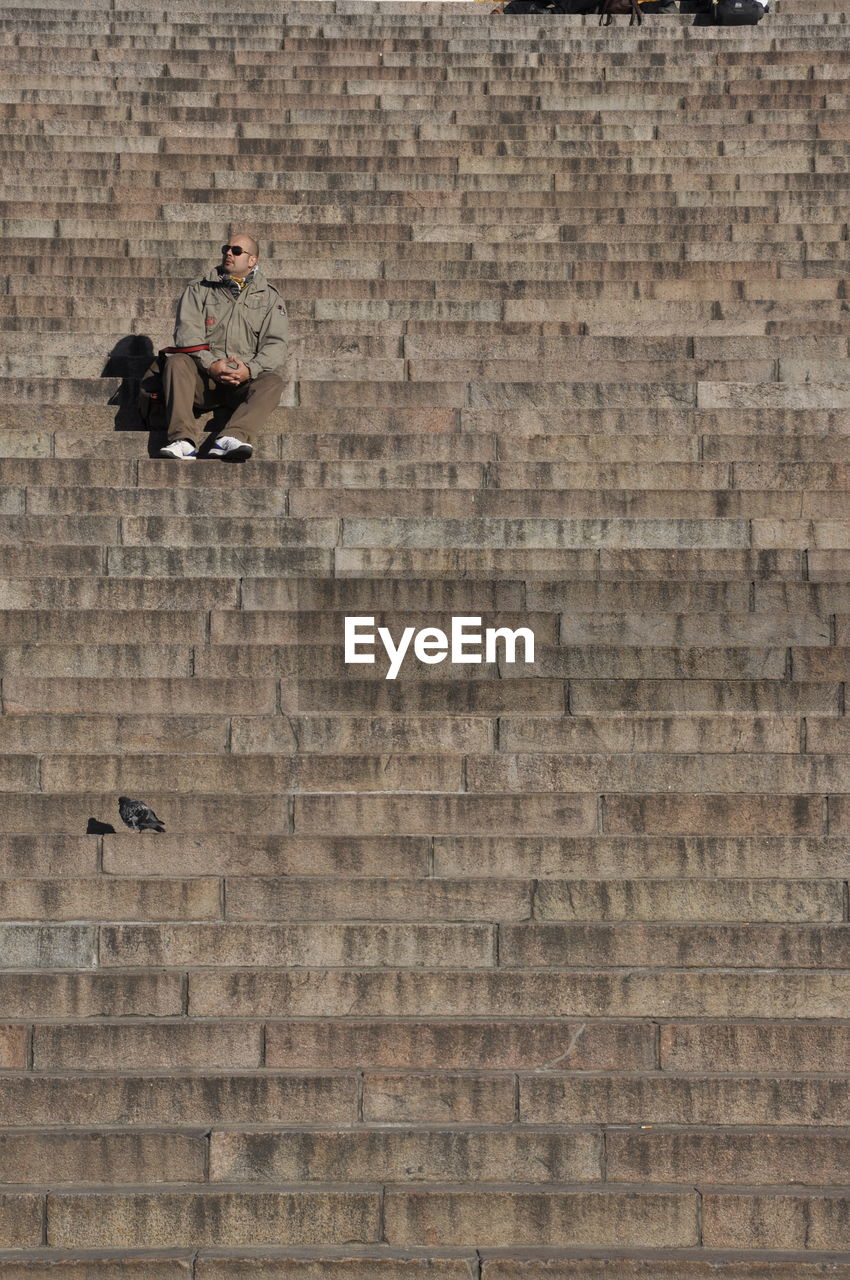 Man sitting on steps