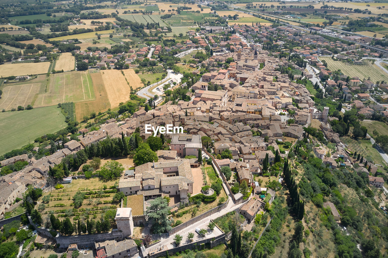 Panoramic frontal aerial view of the medieval town of spello umbria