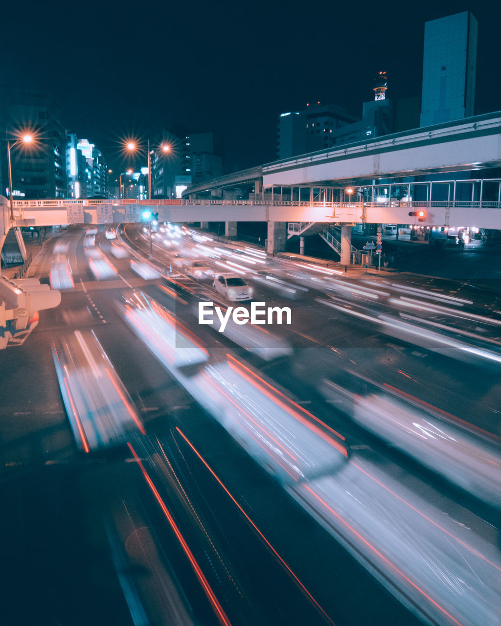 HIGH ANGLE VIEW OF LIGHT TRAILS ON STREET