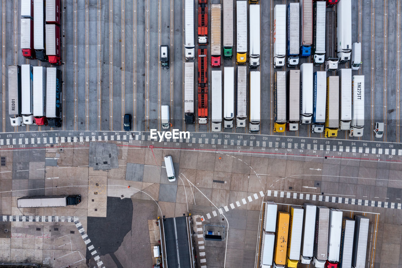 Aerial view of harbor and trucks parked along side each other in dover, uk.
