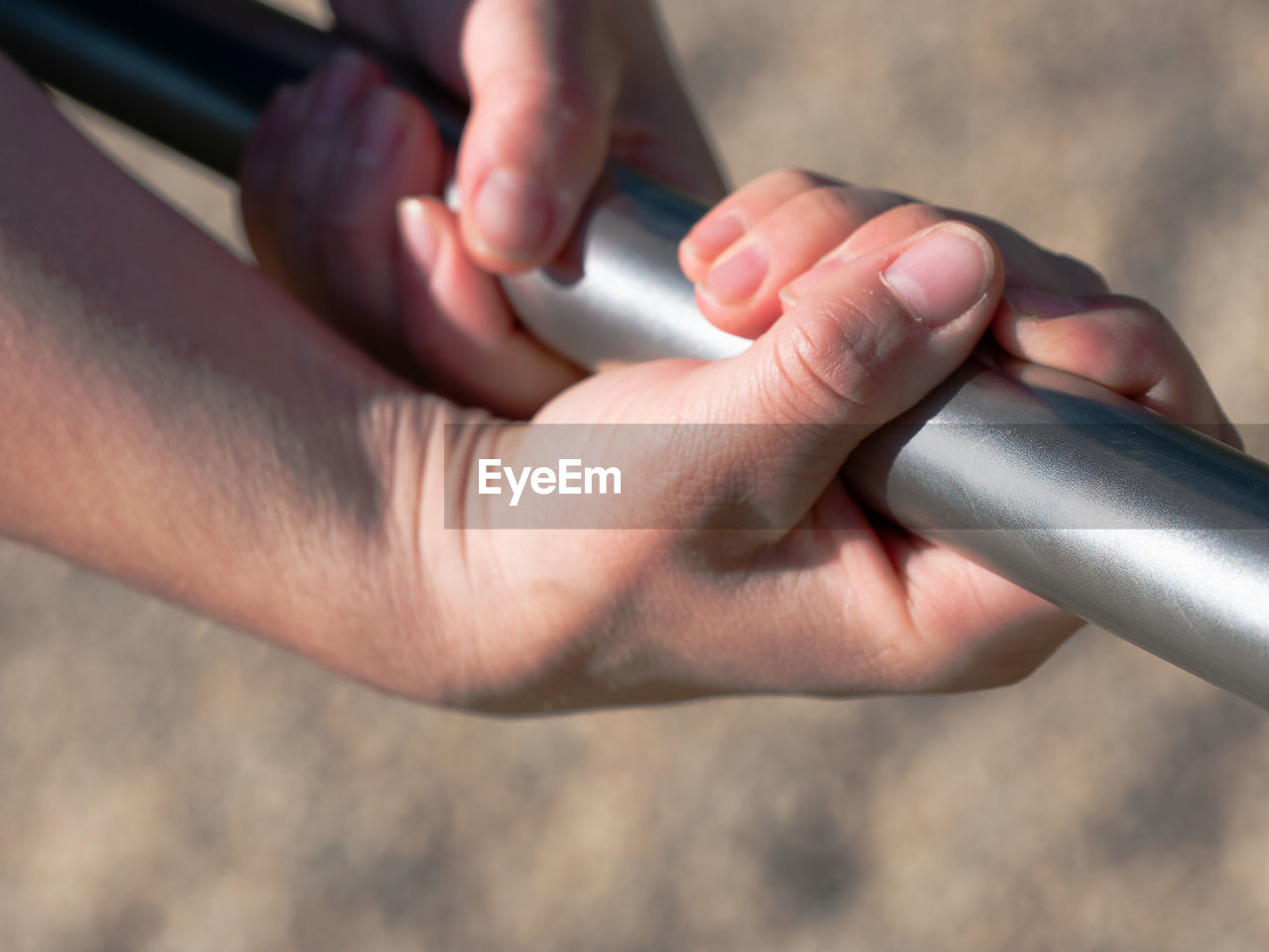 HIGH ANGLE VIEW OF MAN WORKING ON FINGER