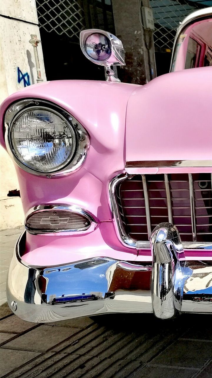 VINTAGE CAR PARKED ON ROAD