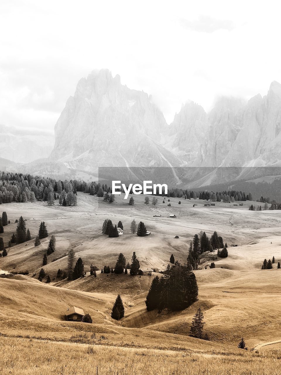 Scenic view of landscape and mountains against sky