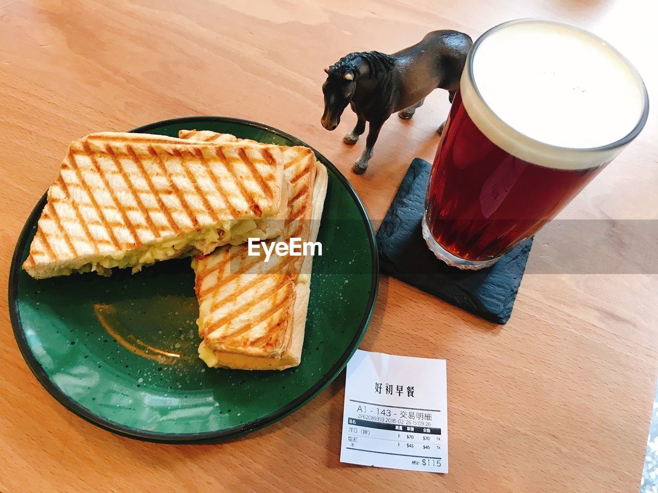 HIGH ANGLE VIEW OF BREAKFAST IN GLASS ON TABLE