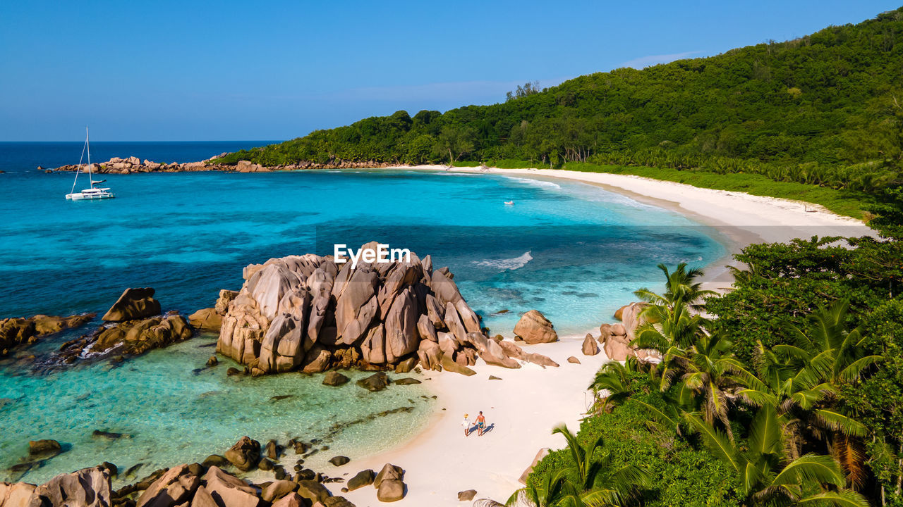 scenic view of sea against mountain