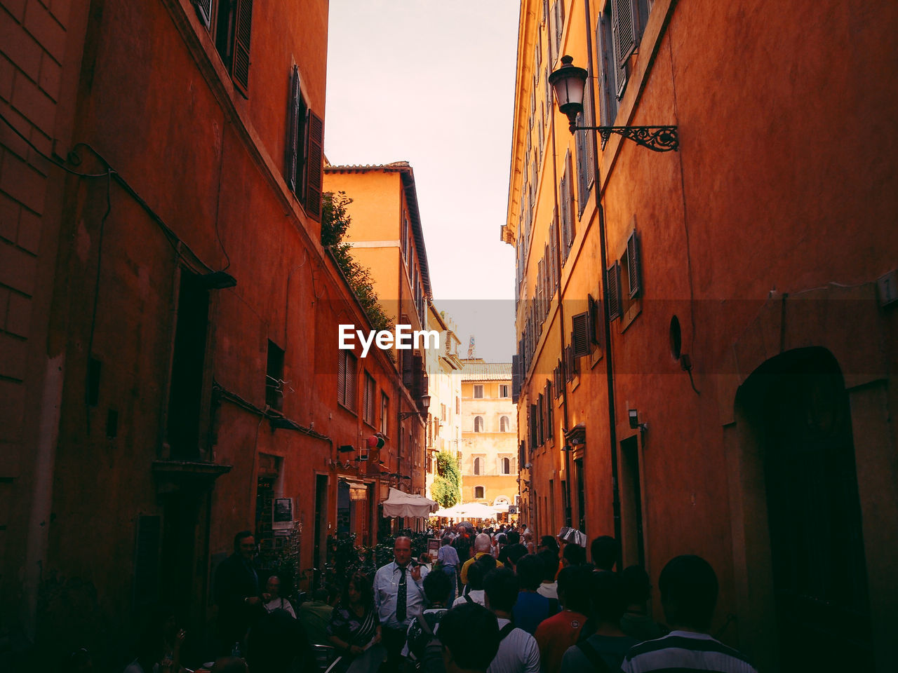 People on street amidst buildings