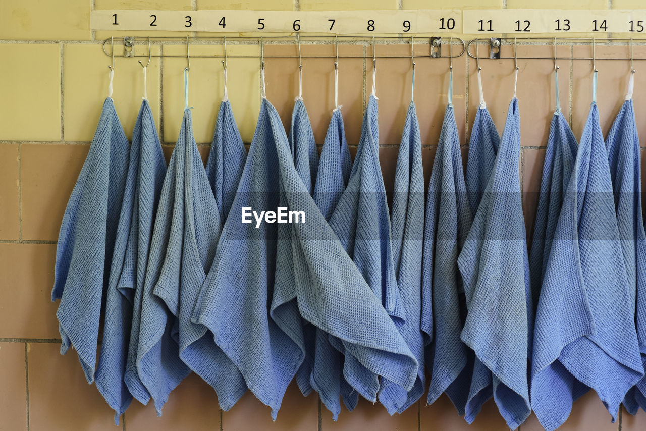Close-up of napkins hanging on rack