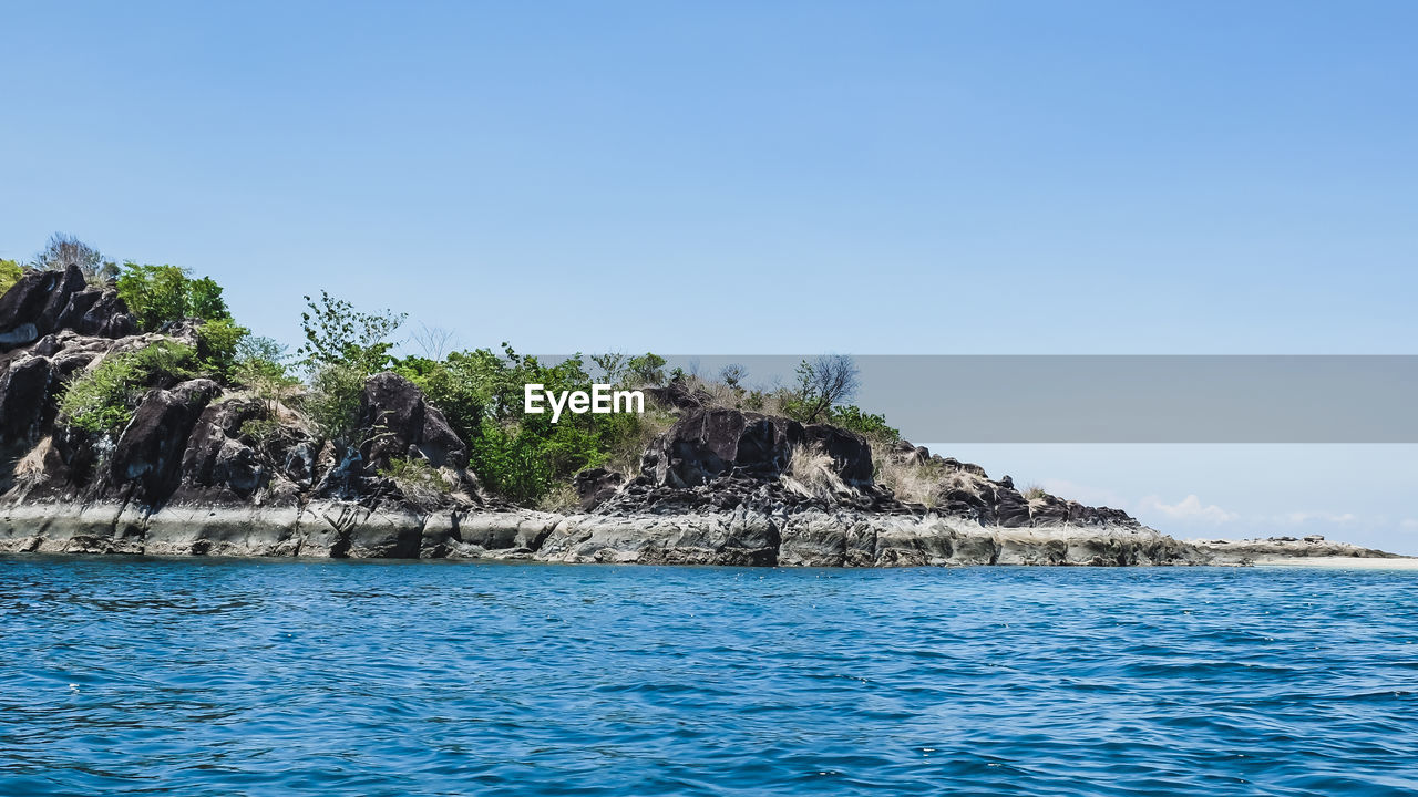 SCENIC VIEW OF SEA AGAINST BLUE SKY