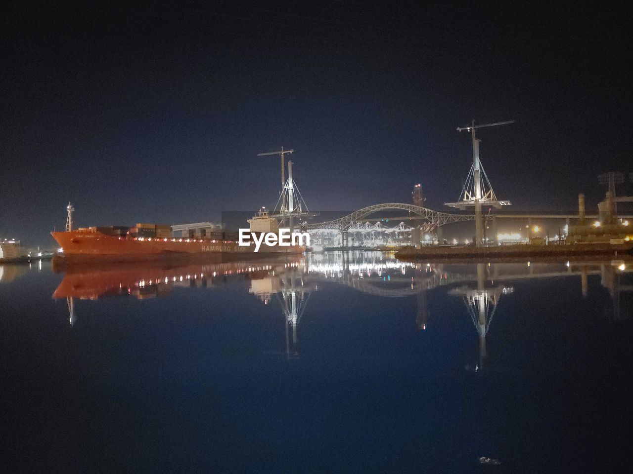 REFLECTION OF ILLUMINATED BUILDINGS IN WATER