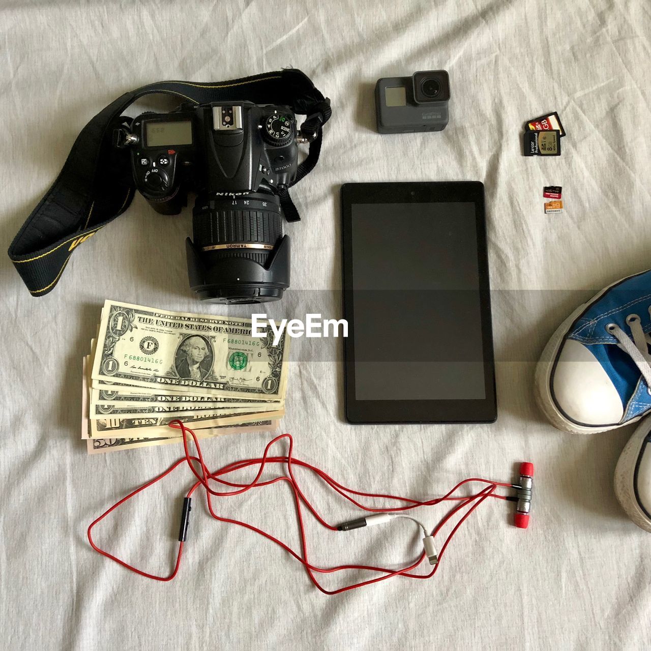 High angle view of various objects on bed