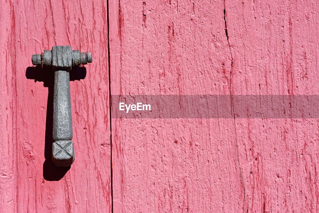 CLOSE-UP OF WEATHERED DOOR