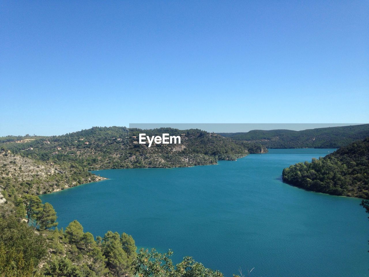 Scenic view of lake against clear sky