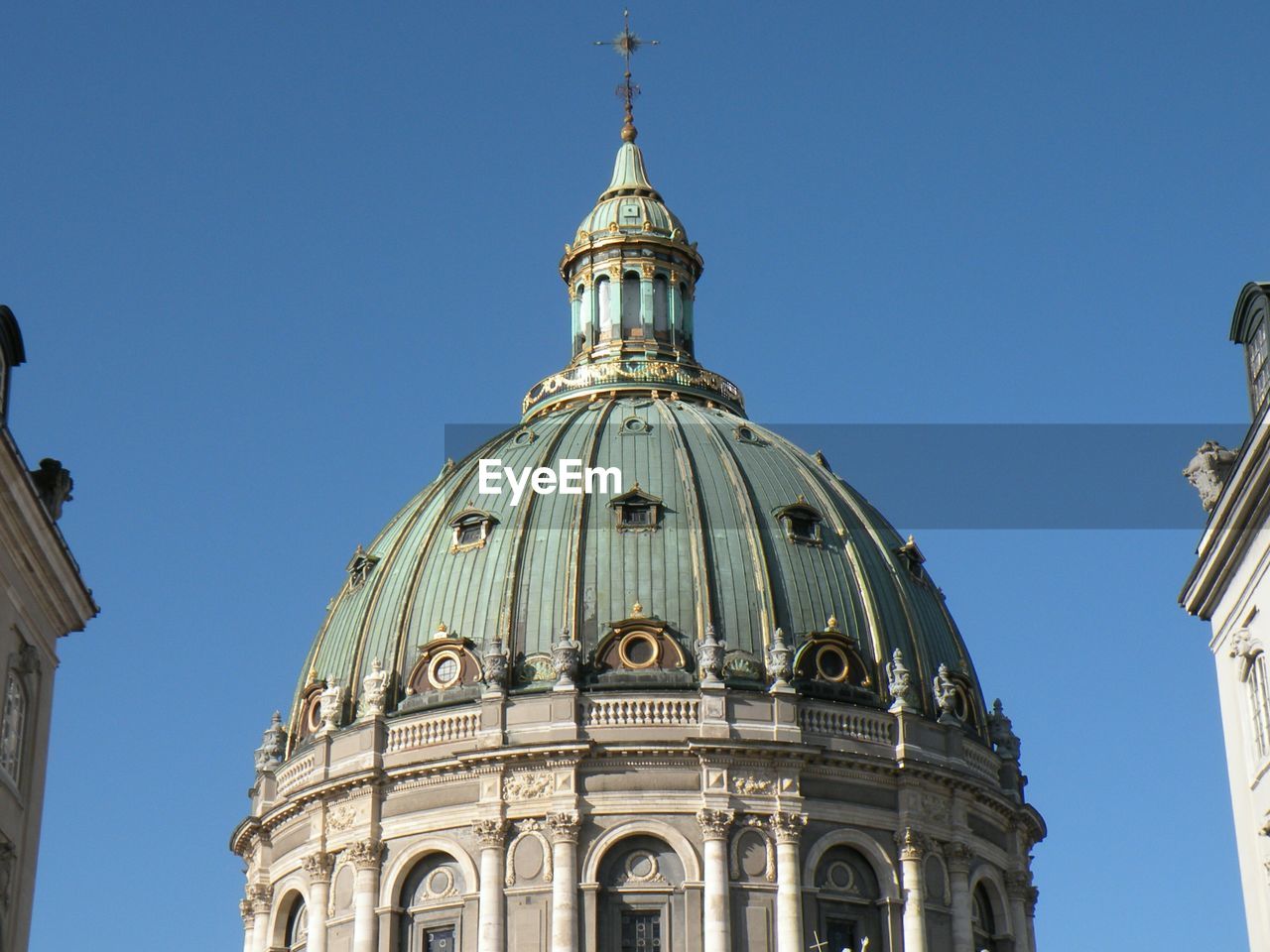 Low angle view of frederik church against clear blue sky