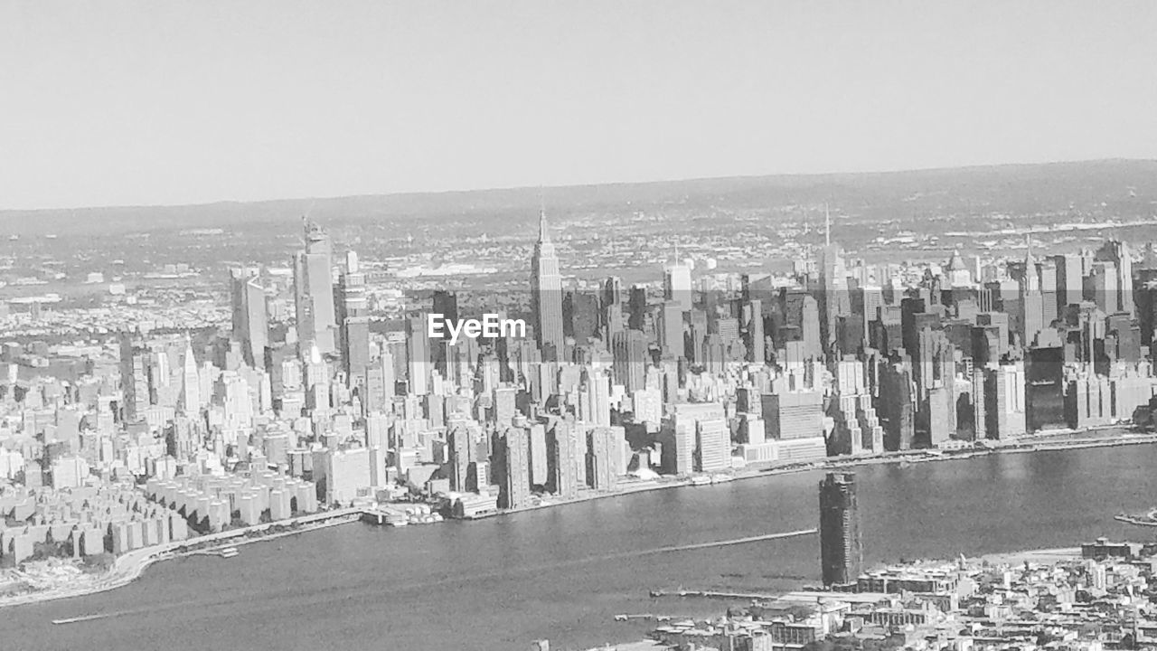 PANORAMIC VIEW OF SEA AGAINST BUILDINGS