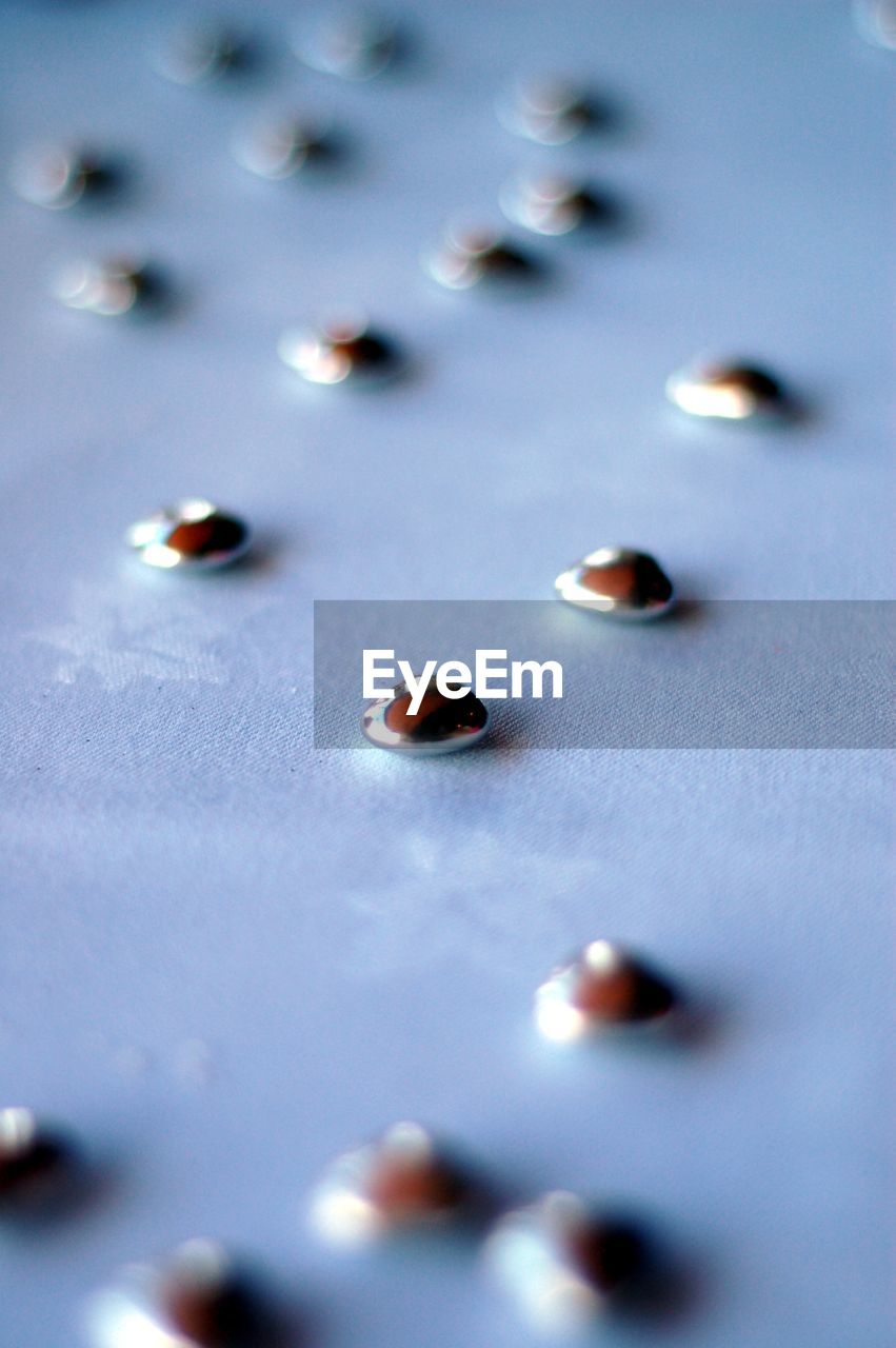 Close-up of gemstones on fabric