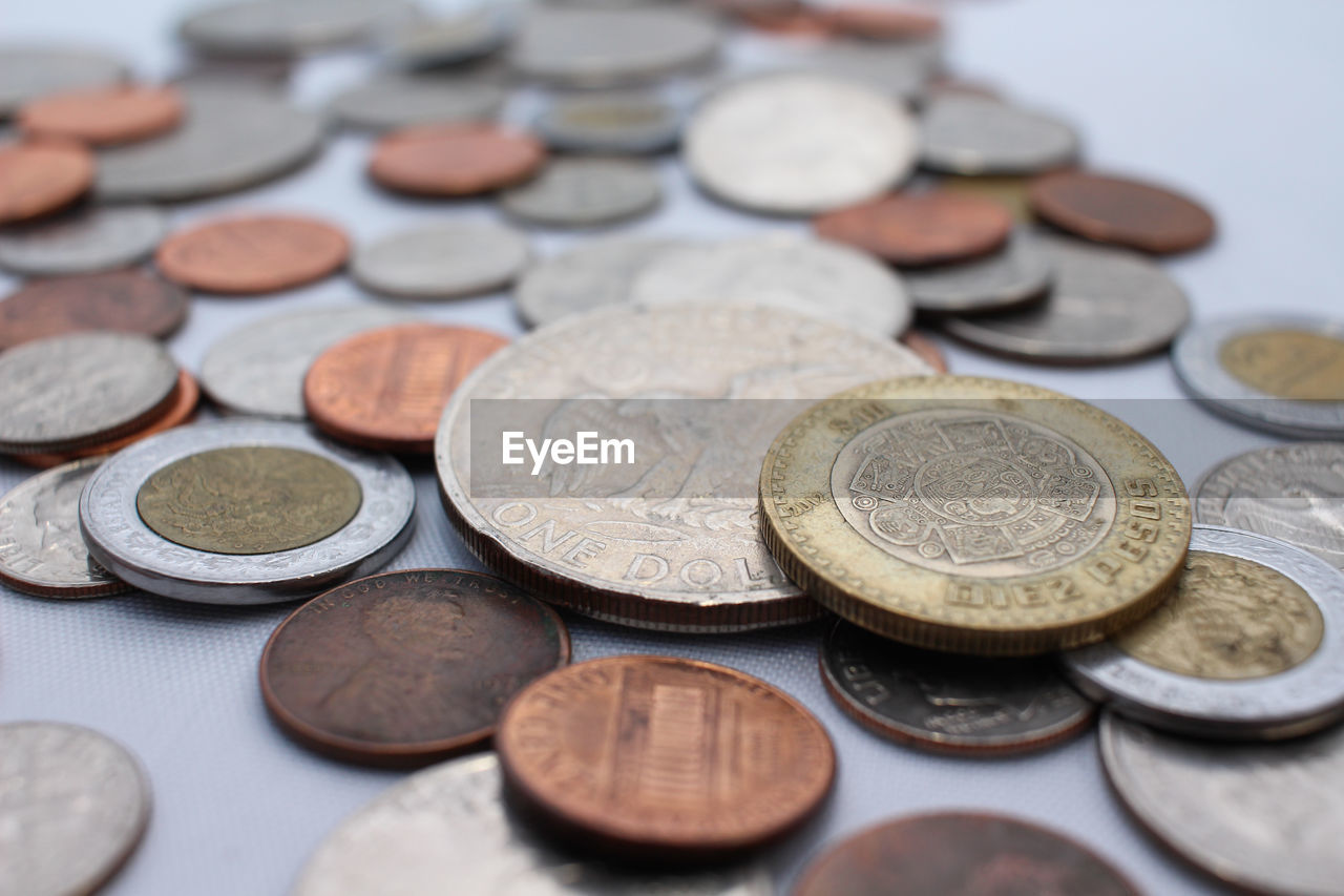 High angle view of coins on table