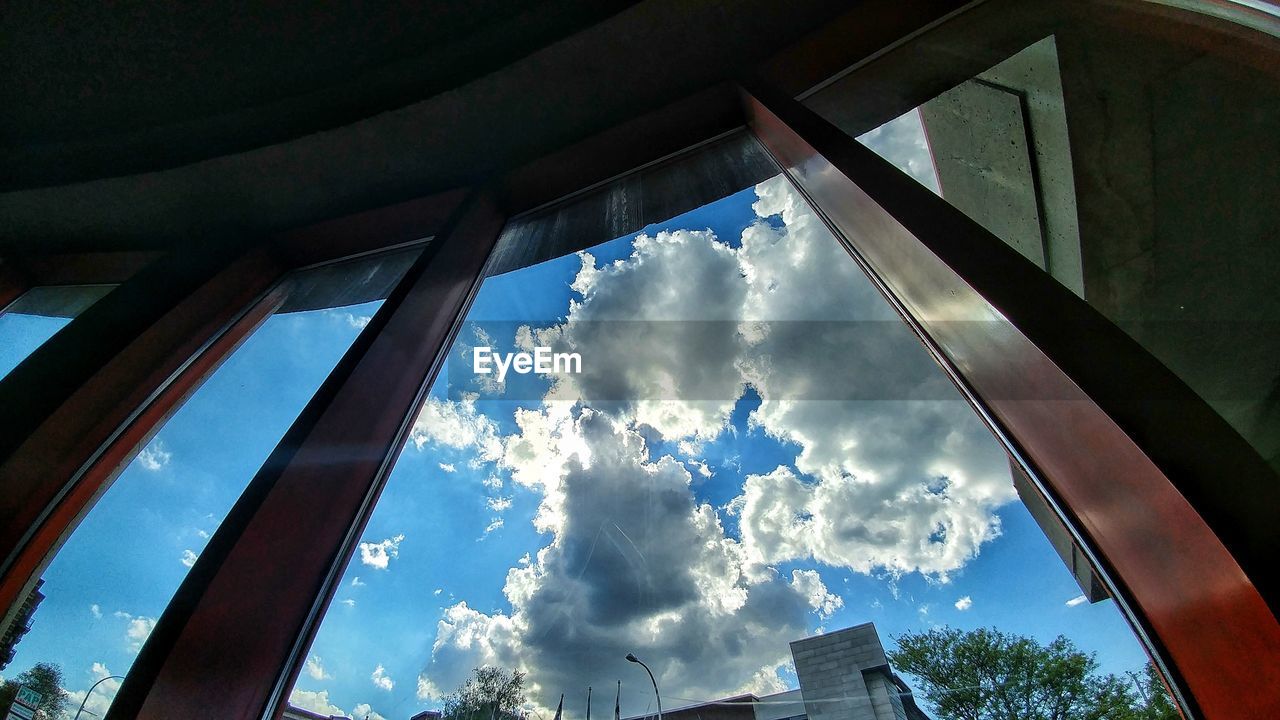 LOW ANGLE VIEW OF SKY THROUGH WINDOW