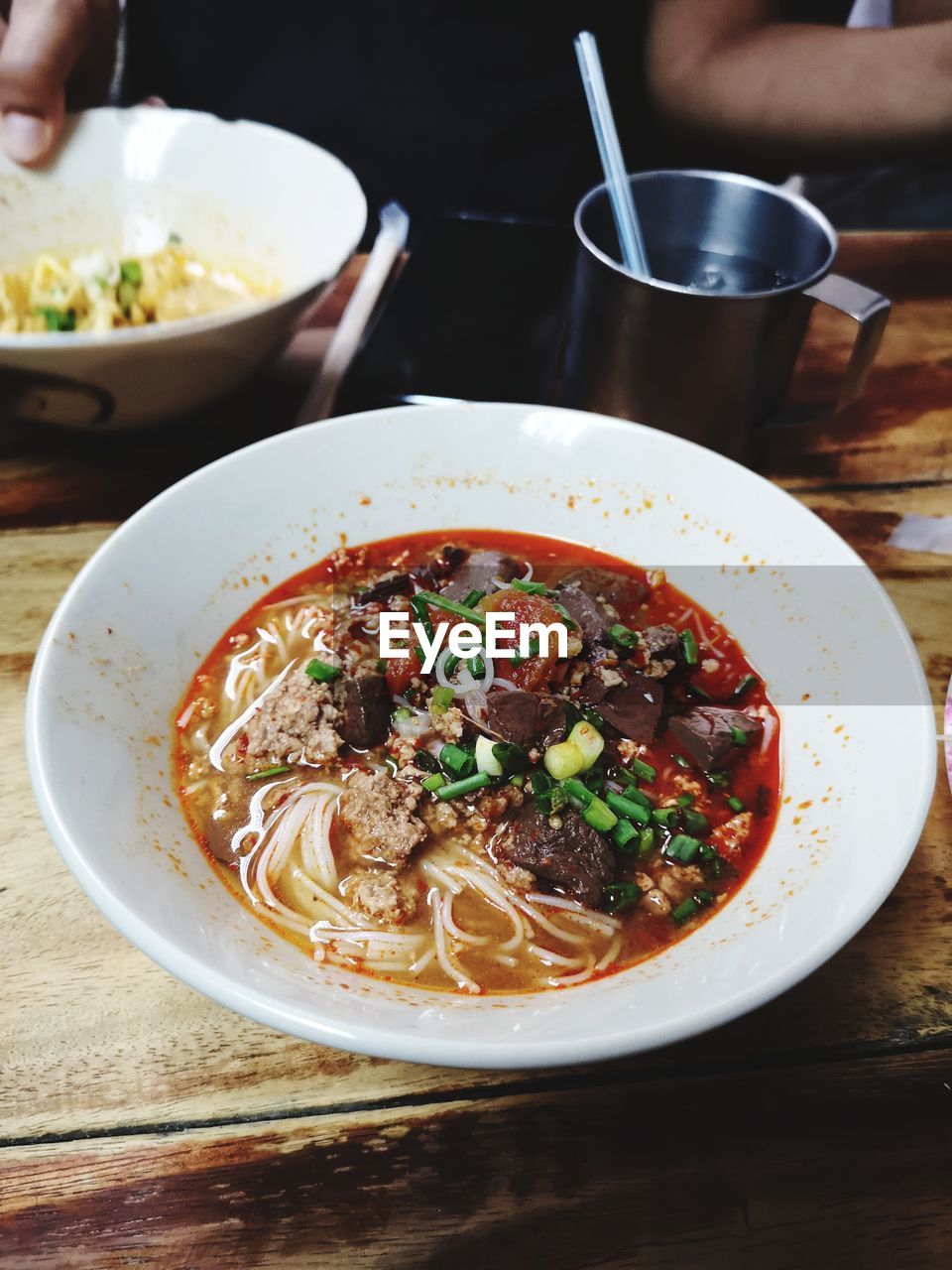 CLOSE-UP OF SOUP SERVED WITH BOWL