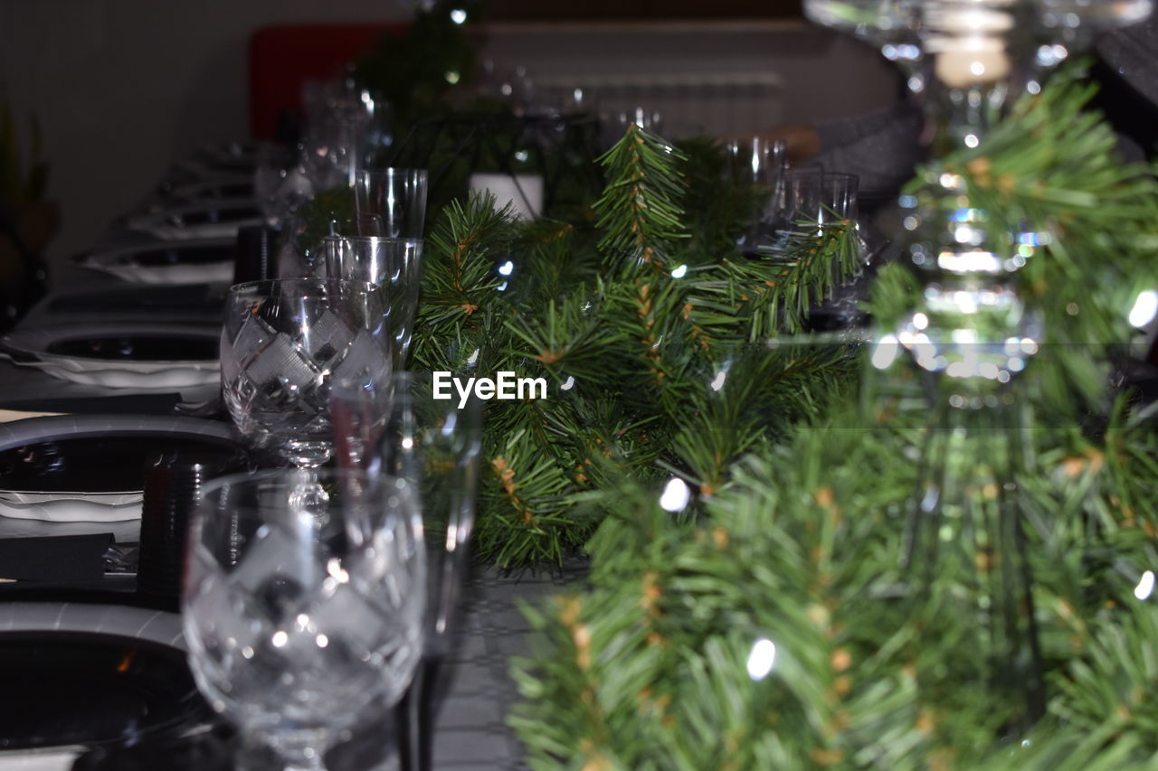 Close-up of illuminated christmas tree on table