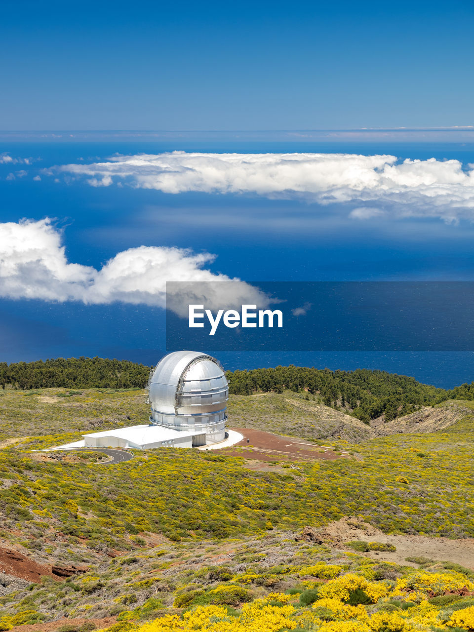 BUILT STRUCTURE ON LAND AGAINST SKY