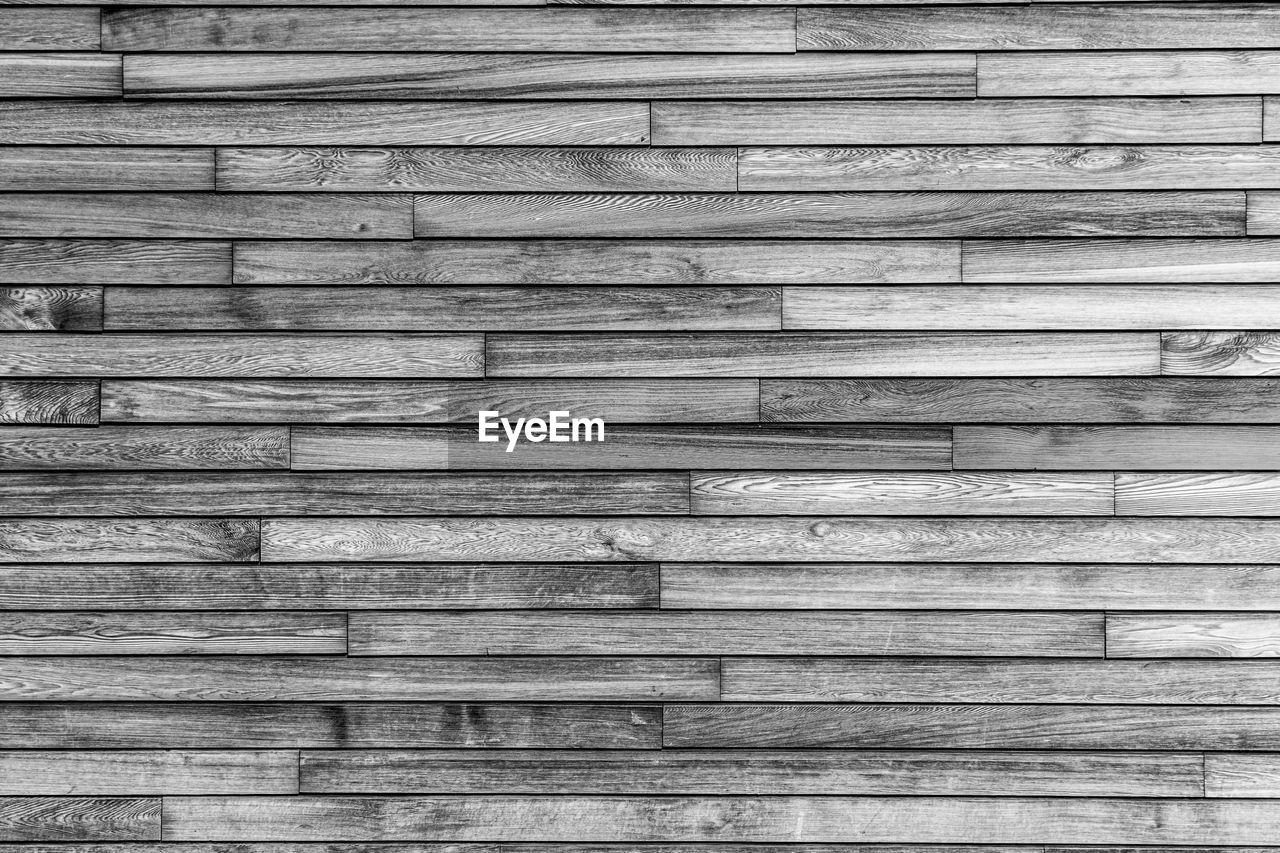 backgrounds, wood, full frame, pattern, textured, no people, black and white, wall, plank, monochrome photography, weathered, monochrome, day, close-up, repetition, old, built structure, floor, wall - building feature, architecture, in a row, rough, outdoors, line, wood grain, white, striped