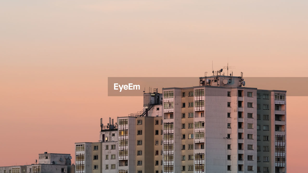 View of buildings against sky during sunset