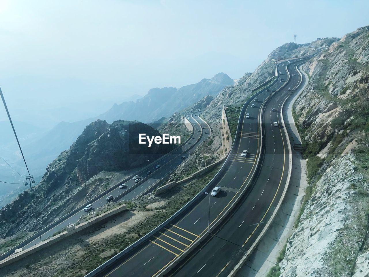 Aerial view of mountain road against sky
