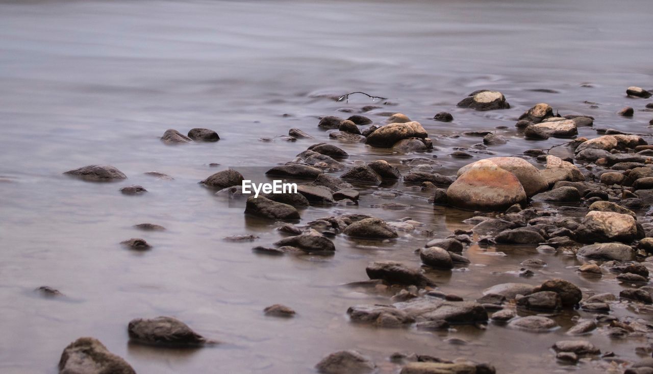 Close-up of pebbles on beach