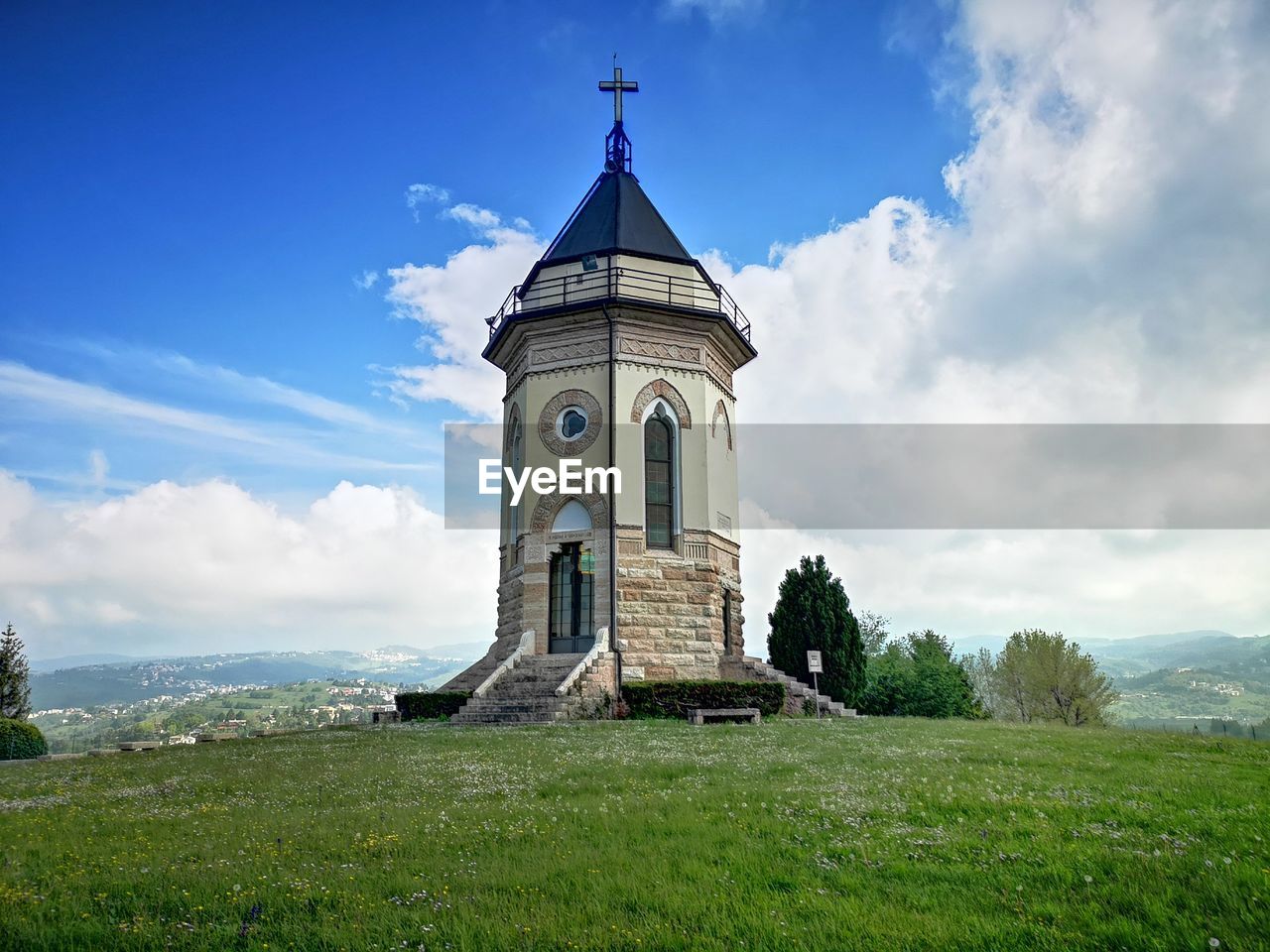 Church amidst buildings against sky