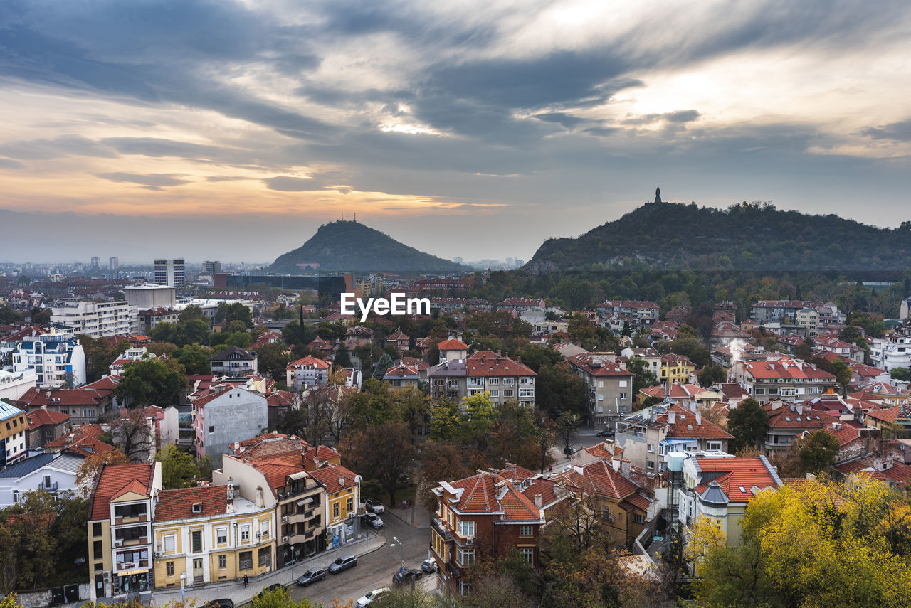 High angle view of townscape against sky at sunset