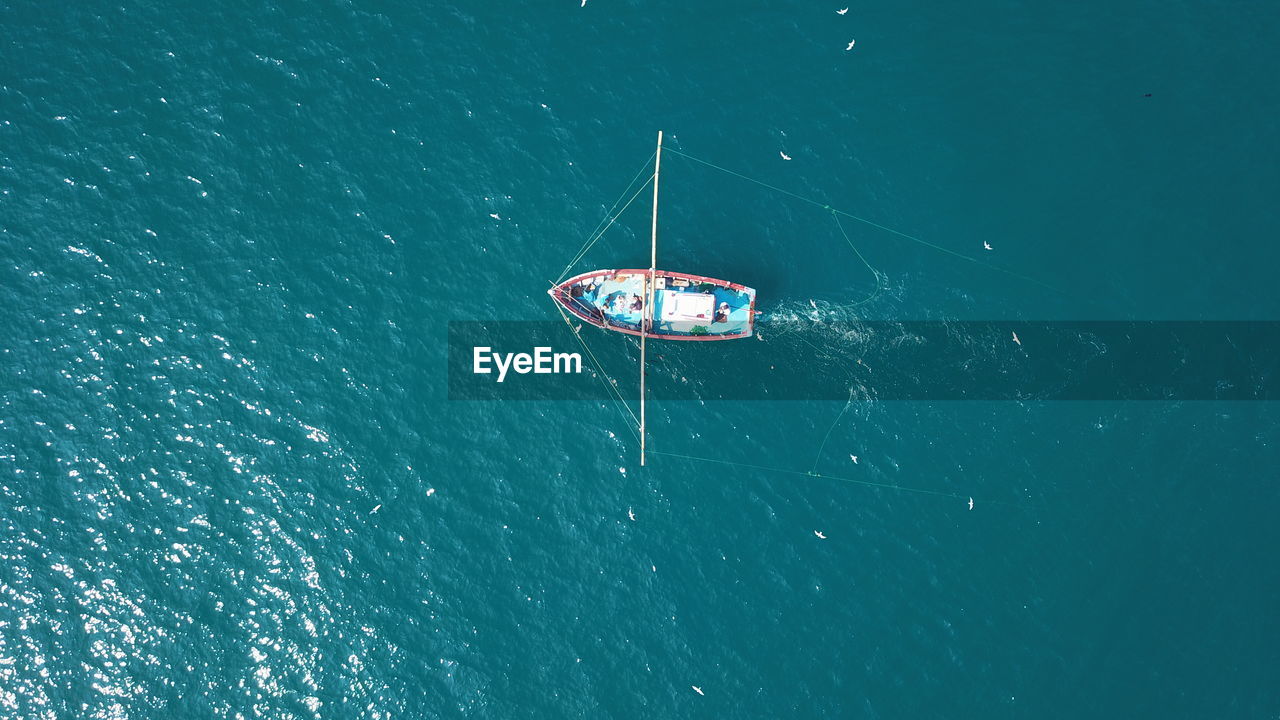 High angle view of sailboat in sea