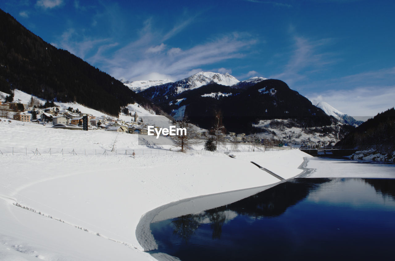 SNOWCAPPED MOUNTAINS AGAINST SKY