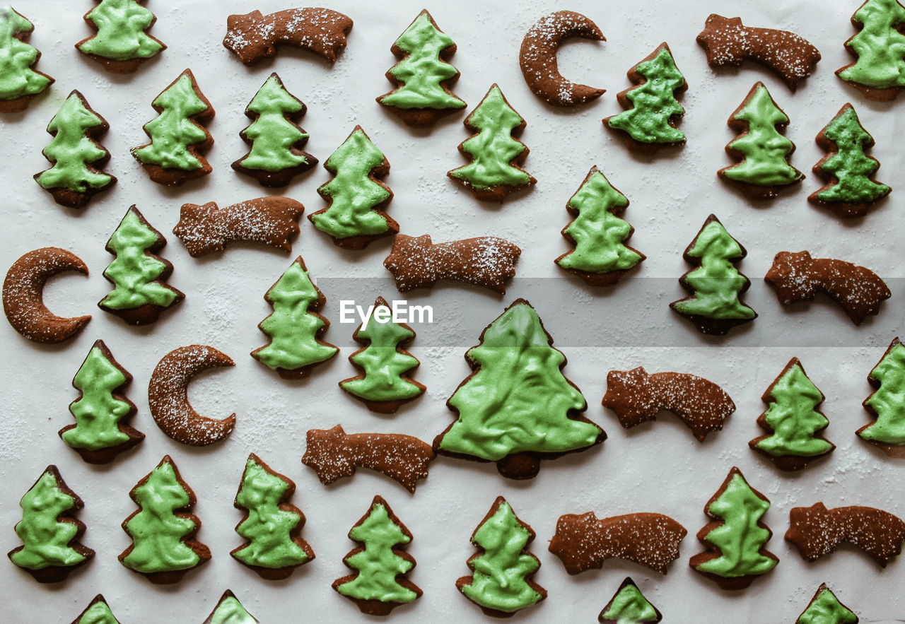 High angle view of gingerbread cookies on table