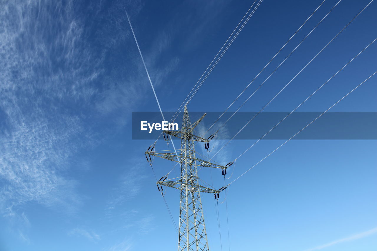 technology, electricity, sky, cable, power supply, power generation, blue, overhead power line, electricity pylon, power line, low angle view, nature, cloud, transmission tower, no people, tower, electrical supply, line, communication, outdoors, architecture, day, built structure, clear sky, metal, outdoor structure, wind, mast, environment