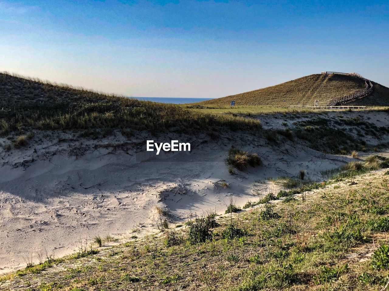 Scenic view of land against sky