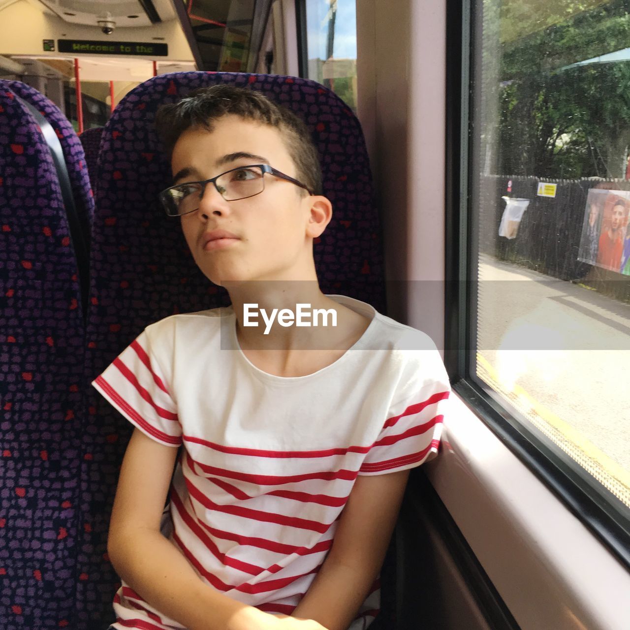 Boy sitting in train