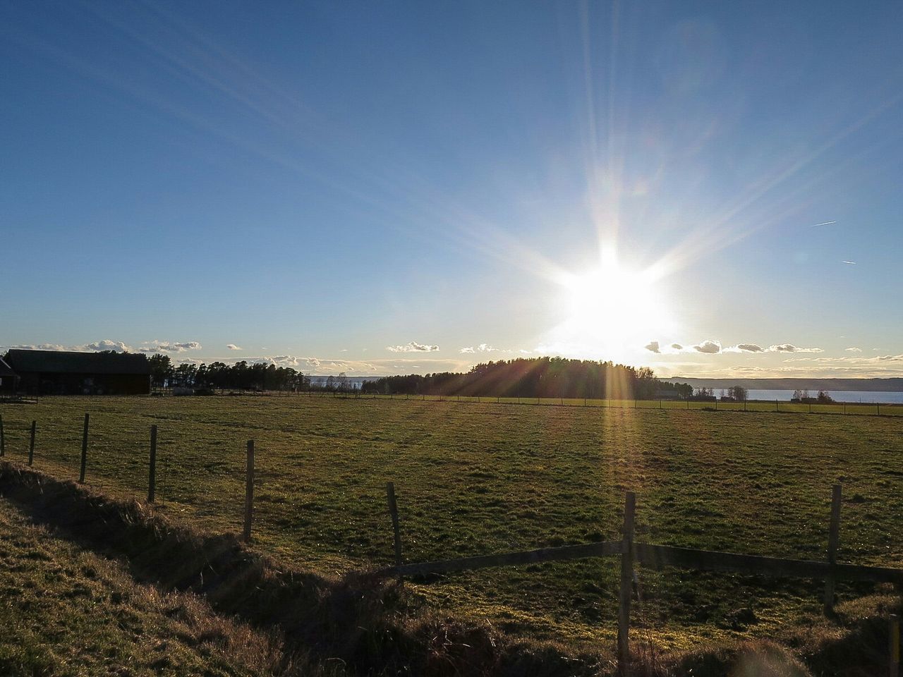 Countryside landscape against clear sky