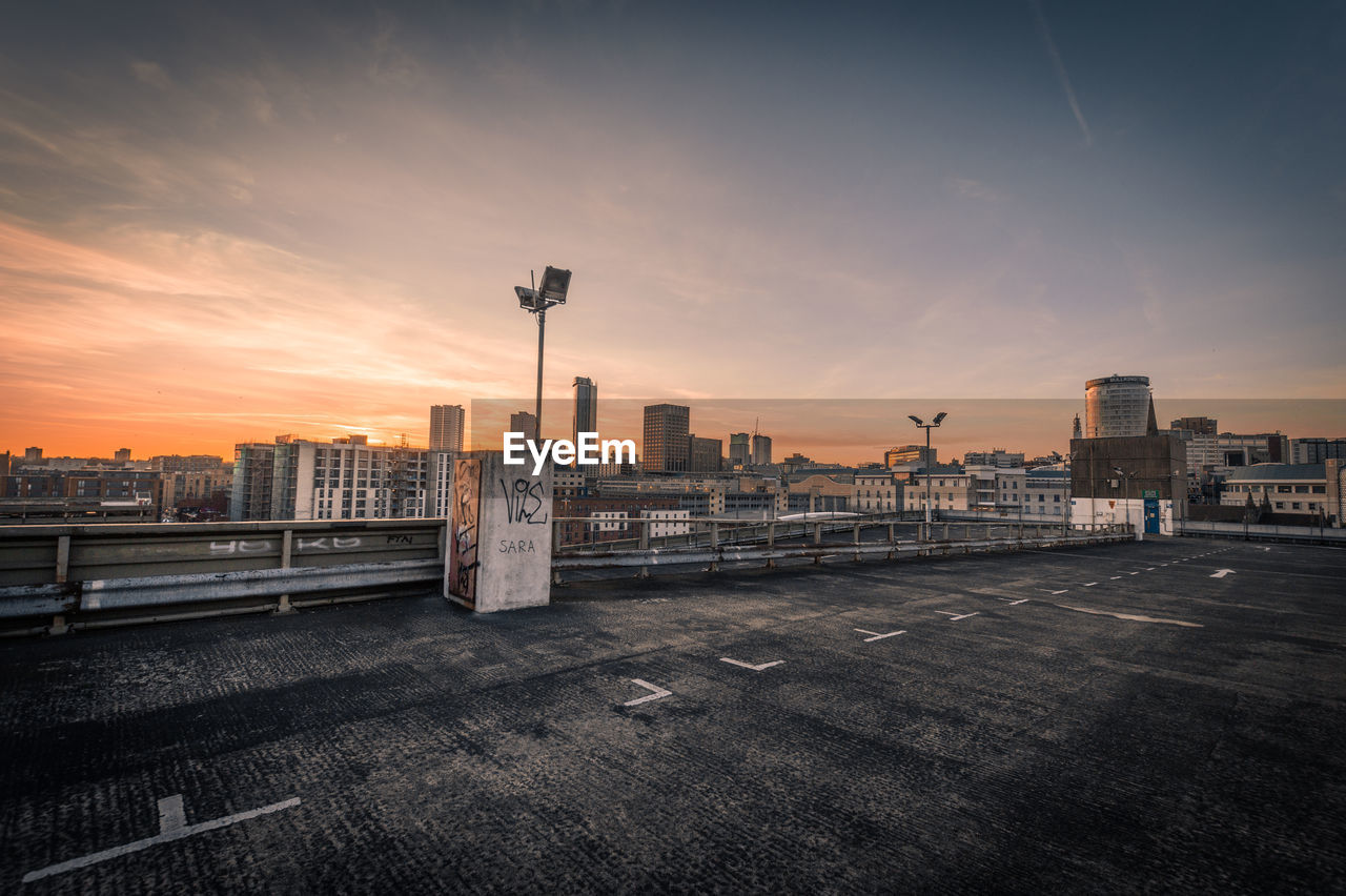 Cityscape against sky during sunset