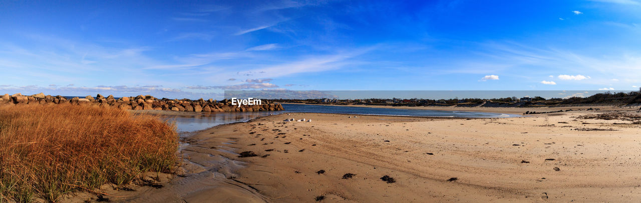 Scenic view of beach against sky