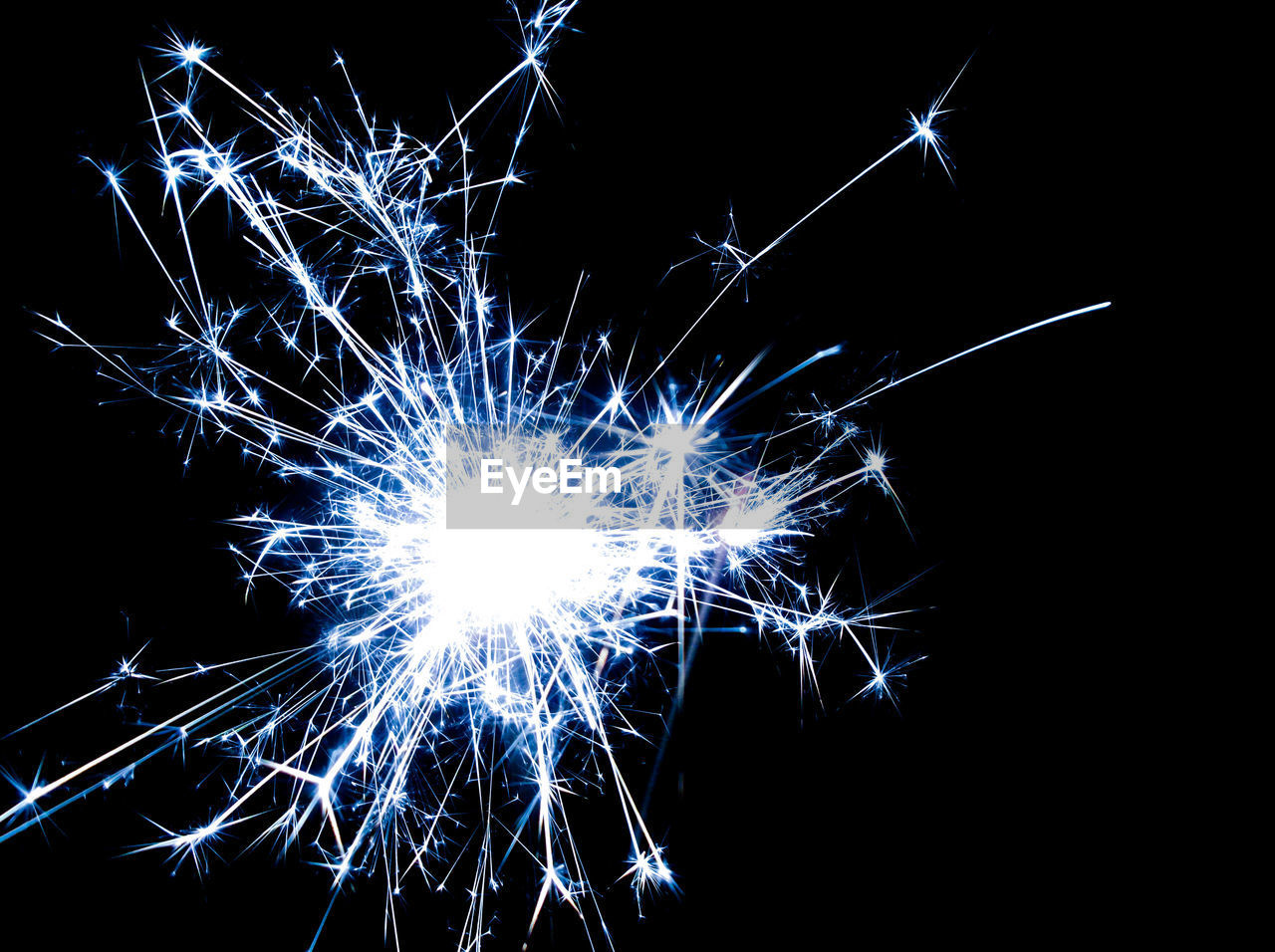 Close-up of firework display against black background