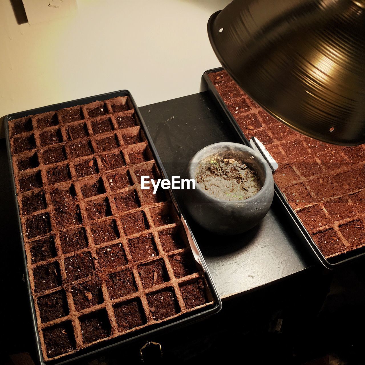 High angle view of soil on table