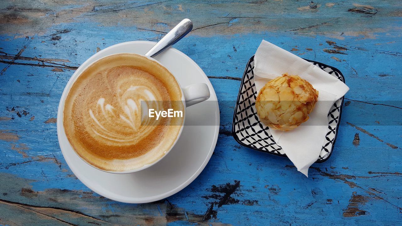 High angle view of cappuccino on table