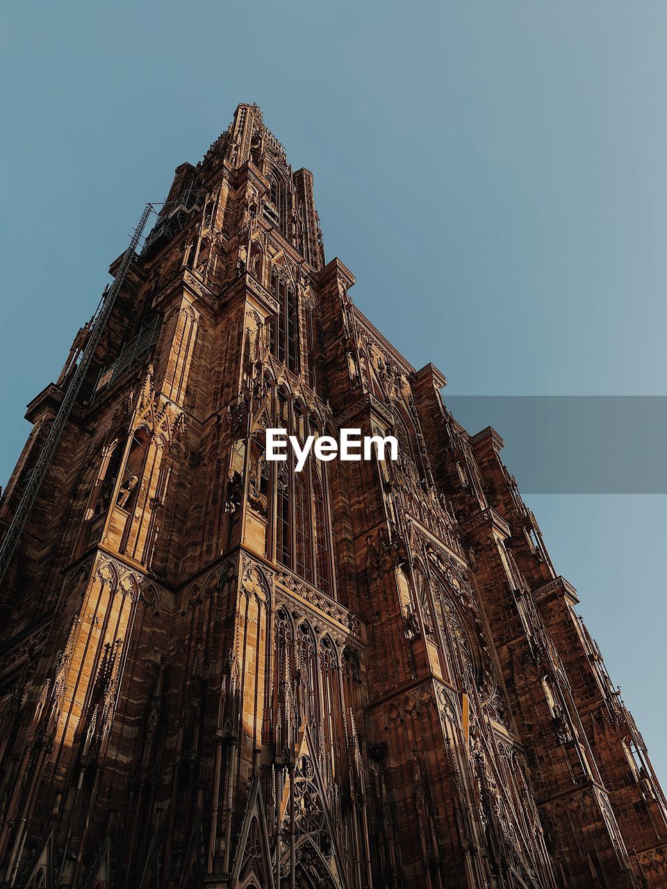 architecture, landmark, built structure, travel destinations, temple, building exterior, sky, low angle view, history, the past, religion, travel, building, nature, belief, tourism, place of worship, no people, spire, spirituality, city, temple - building, ancient history, outdoors, clear sky, ancient, construction industry, tower, skyscraper