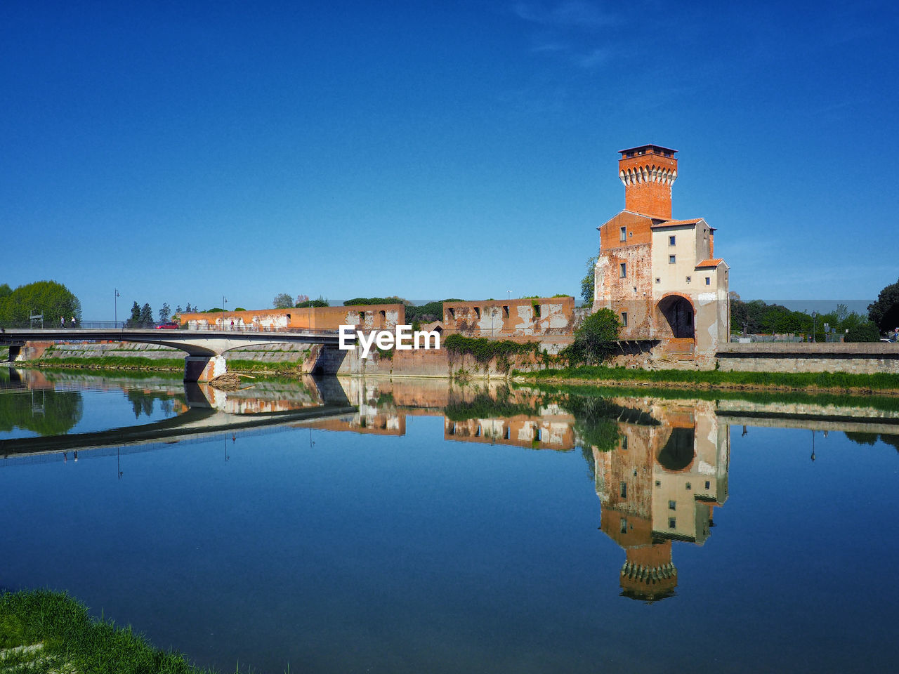 REFLECTION OF BUILDINGS IN WATER