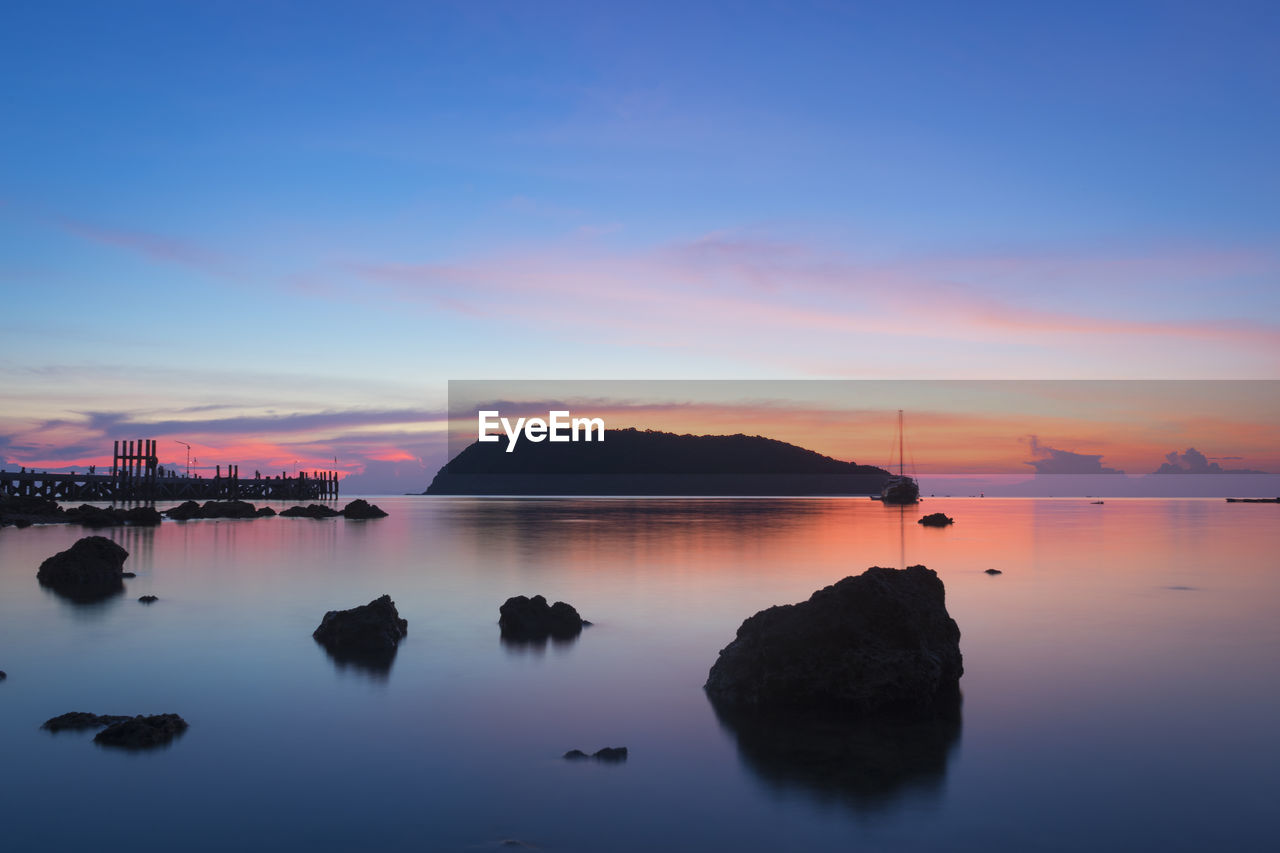 Scenic view of sea against sky during sunset