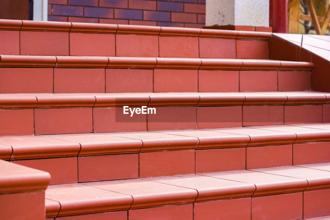 Steps made of brown clinker tiles . cottage porch